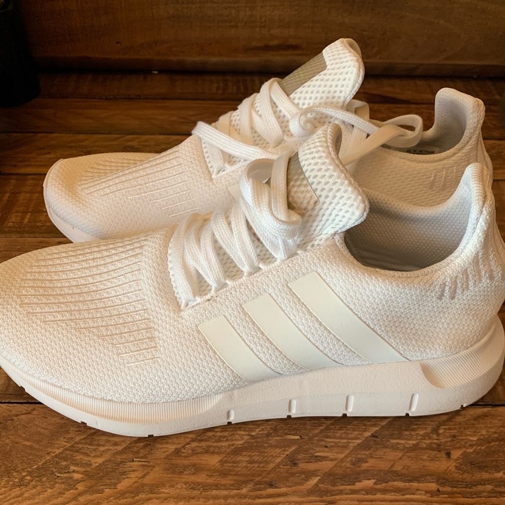 Women’s White adidas athletic shoes